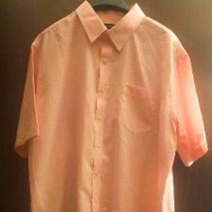 Mens buttoned down dress shirt pocket on left side. Short Sleeve